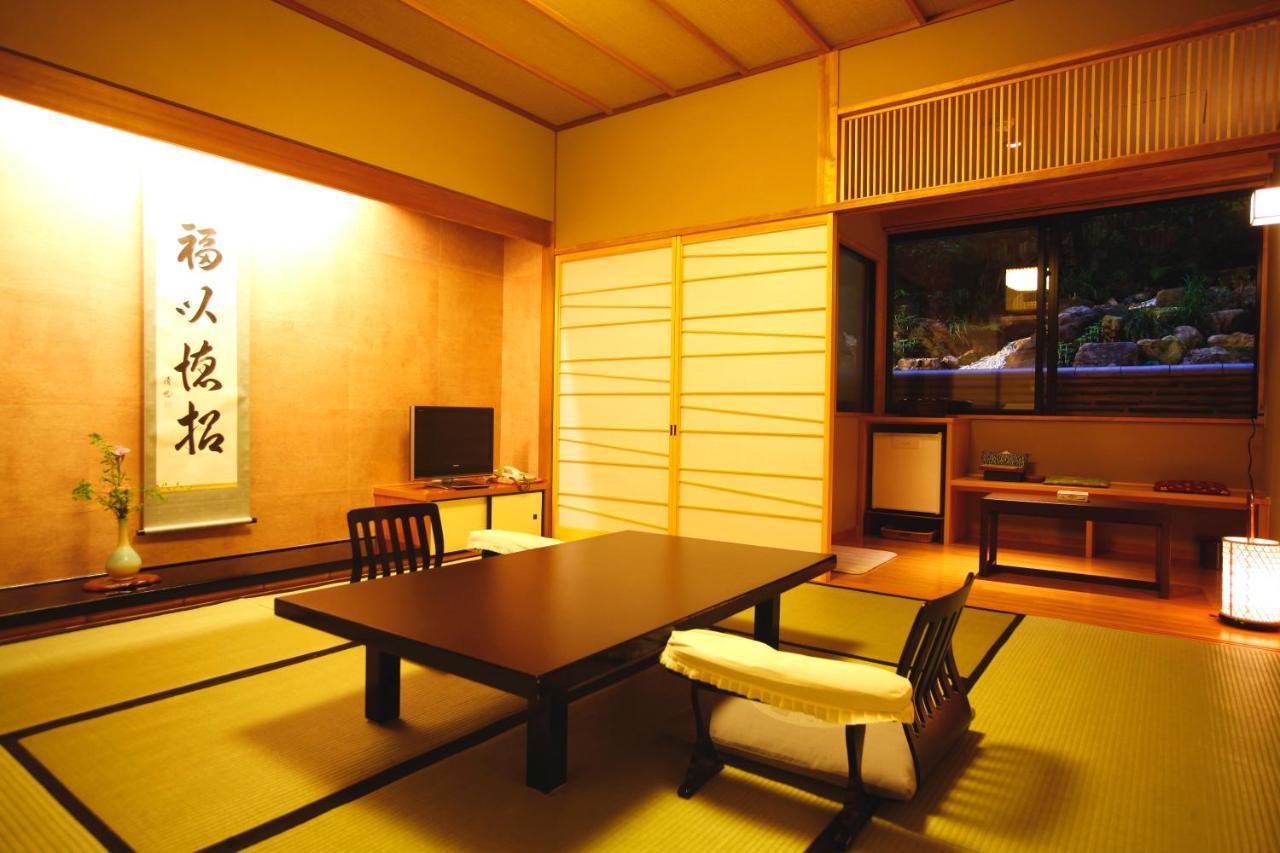 Kyoto Arashiyama Onsen Ryokan Togetsutei ภายนอก รูปภาพ