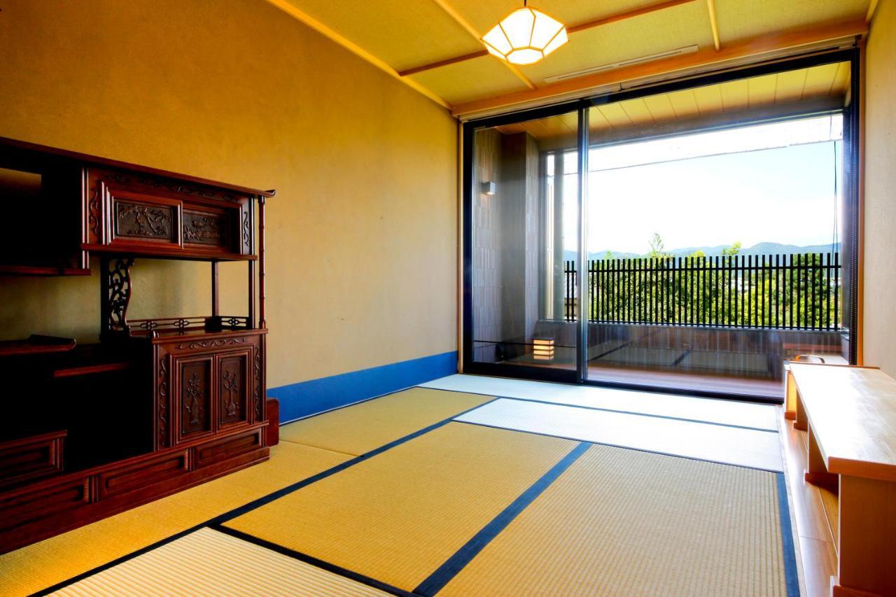 Kyoto Arashiyama Onsen Ryokan Togetsutei ภายนอก รูปภาพ